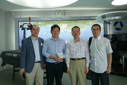 Mr. Kelvin Law, representative from Yunzhou-Tech, Dr. L.K. Chu, Dr. J.W. Wang (from left to right)