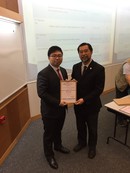 Left to right: Mr. Lok Ka Chai received the prize from Ir Ho Sau Chiu, Chairman of MI division of HKIE
