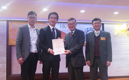 Award ceremony held at the HKIE-SSC Annual Dinner on Jan 13, 2017: (From left to right) Dr. Calvin Or (supervisor), Mr. Hailiang Wang (winner), Mr. Ka-kui Chan, BBS, JP (Chairman of Construction Industry Council), and Ir. Dr. C. M. Ho (Chairman of the Student Project Competition 2016).

